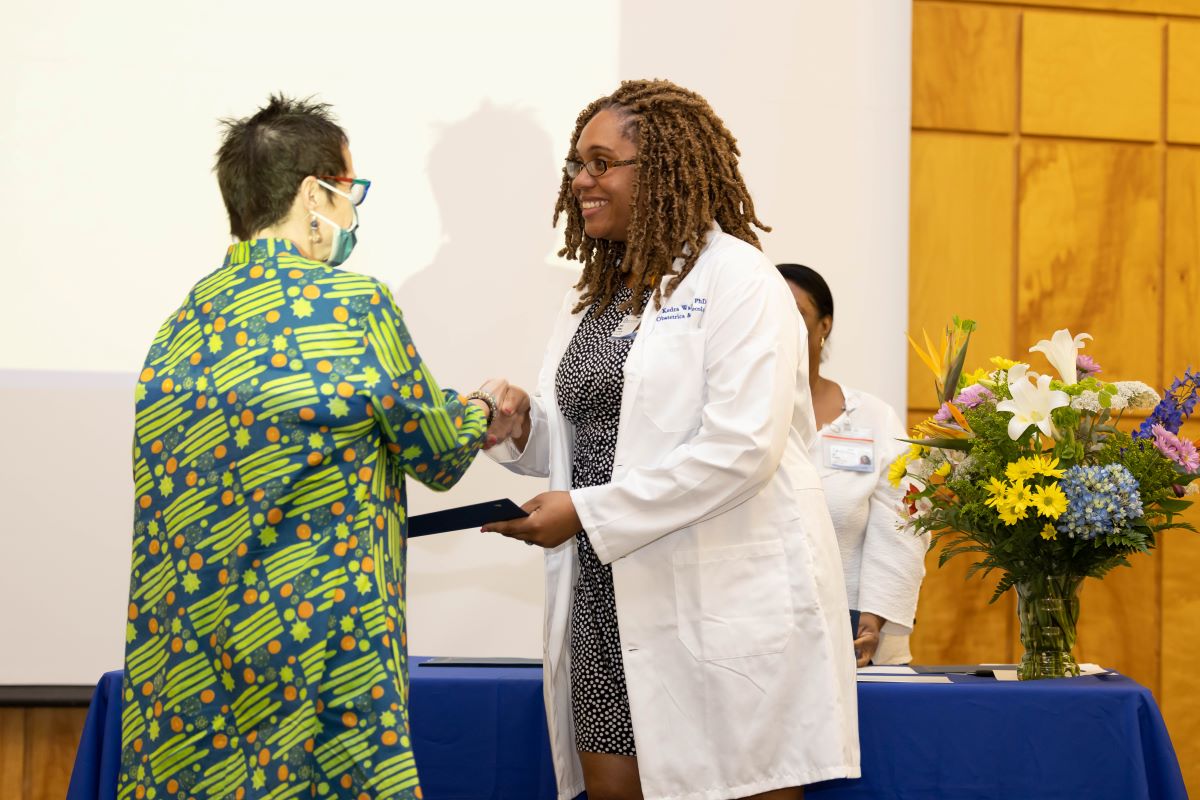 Student accepting an award at the 2023 Honors and Awards Ceremony